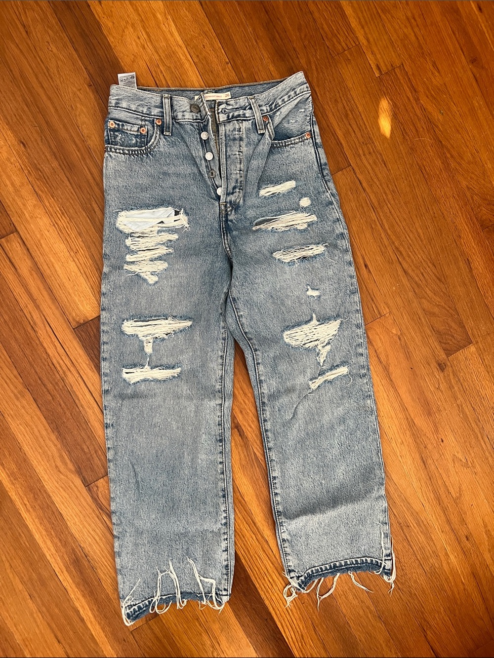 Levi's Light Blue Relaxed Ripped Jeans